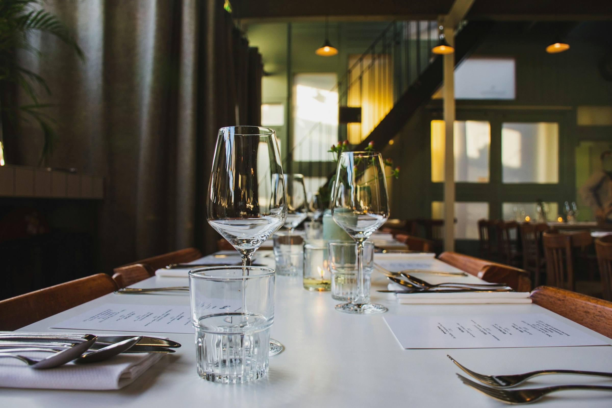 Set table with wine glasses in a restaurant