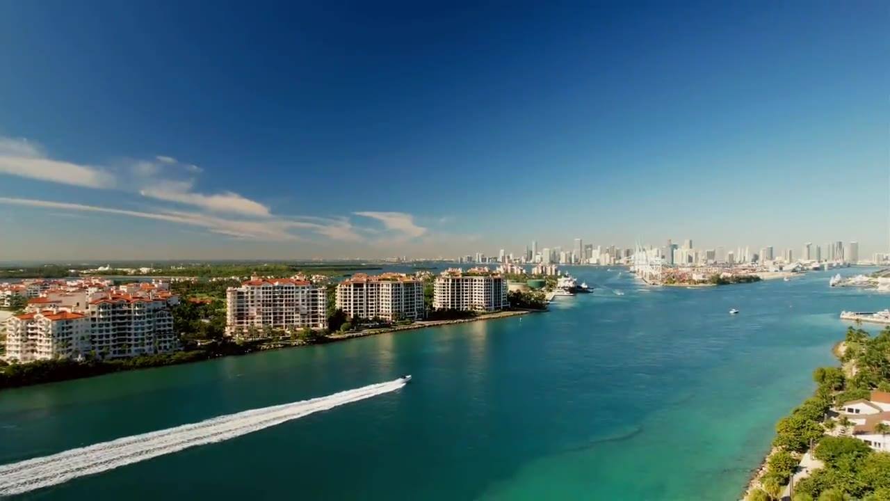 Boat crossing turquoise water off Miami Beach